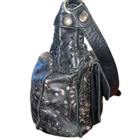 Patricia Nash embossed black leather bag cut outs reveal silver underneath. B5 - Picture 6 of 13